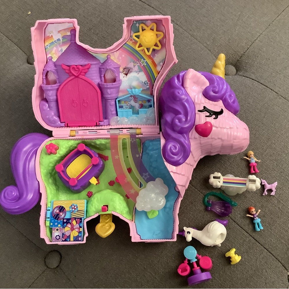 Polly Pocket unicorn party travel play set with accessories and mini dolls